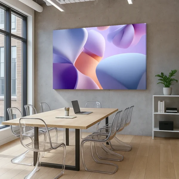 Large canvas print titled ‘Soft Wear’ displayed in a modern conference room; pastel abstract shapes in a soft UI (neumorphic) style on a concrete wall with clear Panton chairs